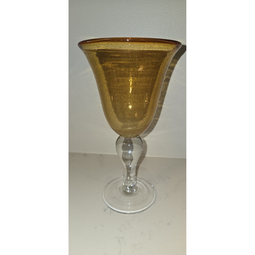 Artland Iris Amber hand-blown goblet featuring a seeded bubble design